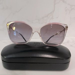 Coach pink sunglasses.